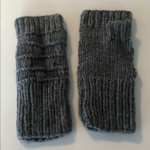 Grey colored hand warmers crochet style